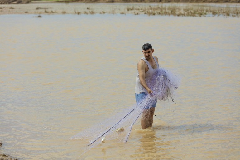 Kirkuk, Iraq - February 11, 2016: Fish hunter in Tigris river in Iraq