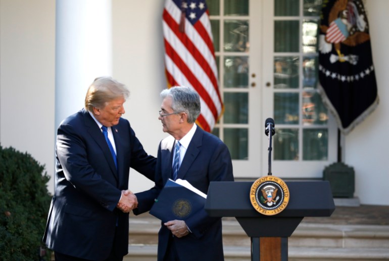 U.S. President Donald Trump shakes hands with Jerome Powell, his nominee to become chairman of the U.S. Federal Reserve at the White House in Washington, U.S., November 2, 2017. REUTERS/Carlos Barria