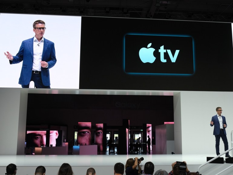 BERLIN, GERMANY - SEPTEMBER 05: A Samsung spokesman announces at cooperation with Apple for AppleTV at the Samsung press conference at the 2019 IFA home electronics and appliances trade fair on September 05, 2019 in Berlin, Germany. The 2019 IFA fair will be open to the public from September 6-11. (Photo by Sean Gallup/Getty Images)