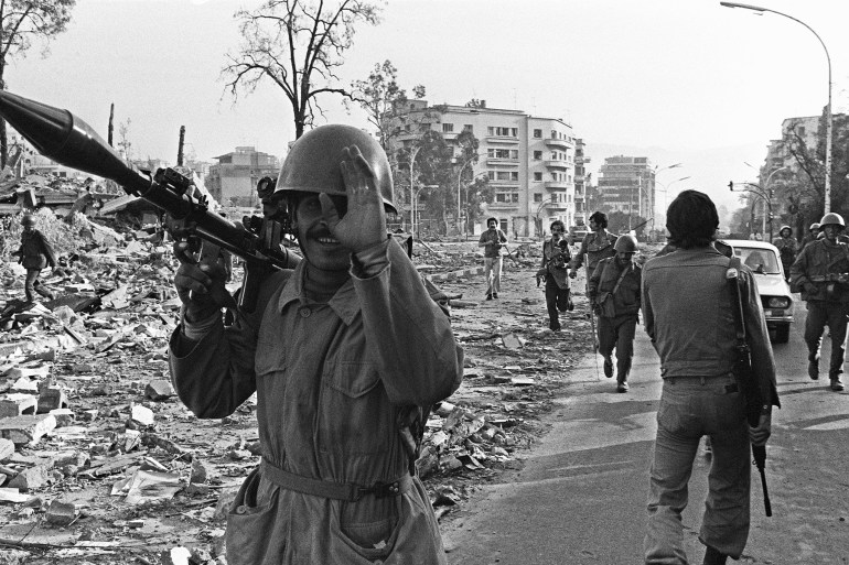 Syrian soldiers, members of the joint Arab "green helmets" peace-keeping force to Lebanon, take position 15 November 1976 in Beirut. In early June 1976, Syria launched a full-scale invasion of Lebanon officially to end the civil war and restore peace, but unofficialy, it became clear, to crush the Palestinians. During the course of the fighting there had been more that 50 abortive cease-fires and an estimated 60,000 people had been killed and some 100,000 injured. The Lebanese civil war erupted in April 1975. AFP PHOTO XAVIER BARON (Photo by XAVIER BARON / AFP)