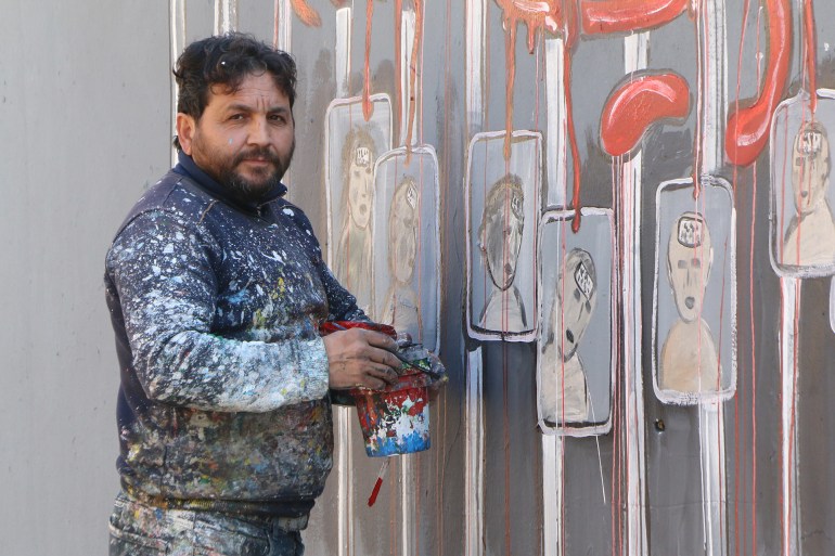 جدارية تحمل صورة قيصر على جدار مدرسة شعيب في مدينة بنش شرق إدلب