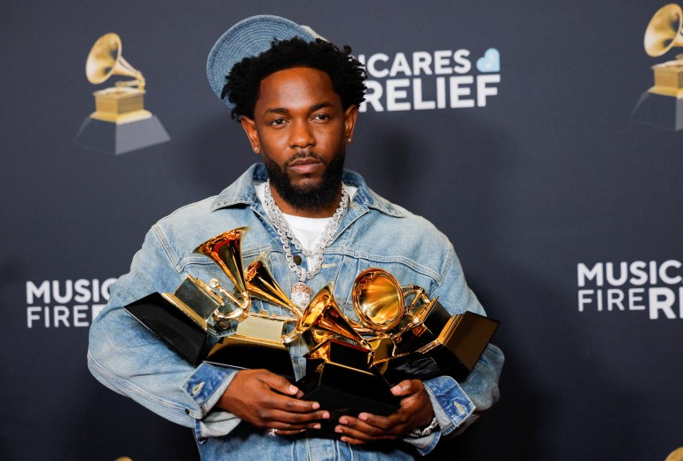 Kendrick Lamar, winner of the Record Of The Year, Best Rap Performance, Best Rap Song, Best Music Video, and Song Of The Year awards, poses in the press room during the 67th Annual Grammy Awards in Los Angeles, California, U.S., February 2, 2025. REUTERS/Mike Blake TPX IMAGES OF THE DAY