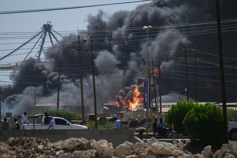 Smoke billows after drone strikes by the paramilitary Rapid Support Forces (RSF) targeted the northern port in the Red Sea city of Port Sudan, Sudan, Tuesday, May 6, 2025. (AP Photo)