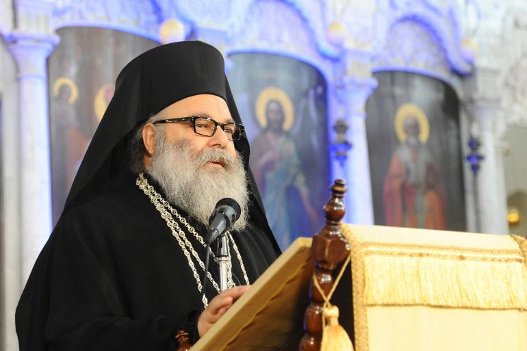 Patriarch John X Yazigi, Greek Orthodox Patriarch of Antioch and All the East, delivers a speech at a ceremony to pray for peace in a country plagued by two and a half years of war, during a Christmas mass at al-Maryamyeh church in Damascus December 25, 2013, in this handout photograph released by Syria's national news agency SANA. REUTERS/SANA/Handout via Reuters (SYRIA - Tags: POLITICS RELIGION ANNIVERSARY) ATTENTION EDITORS ‚Äì THIS IMAGE WAS PROVIDED BY A THIRD PARTY. FOR EDITORIAL USE ONLY. NOT FOR SALE FOR MARKETING OR ADVERTISING CAMPAIGNS. THIS PICTURE IS DISTRIBUTED EXACTLY AS RECEIVED BY REUTERS, AS A SERVICE TO CLIENTS