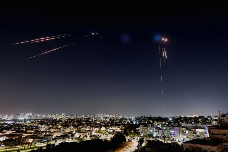 Missiles launched from Iran are intercepted as seen from Ashkelon, Israel, June 15, 2025. REUTERS/Amir Cohen