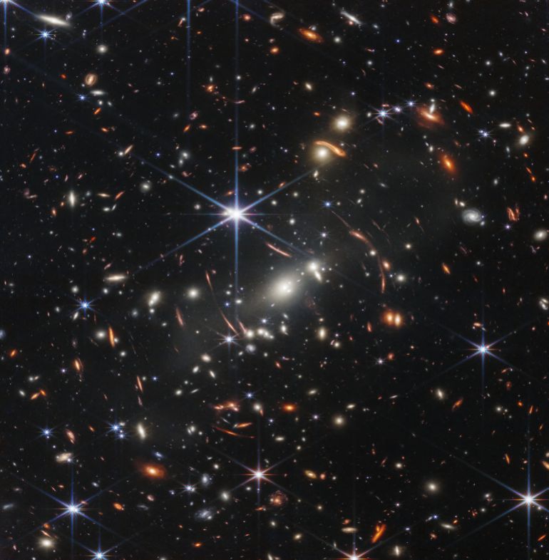 In this handout photo from NASA obtained on July 11, 2022, the first infrared image from the James Webb Space Telescope (JWST) is seen. - The JWST is the most powerful telescope launched into space and it reached its final orbit around the sun, approximately 930,000 miles from Earths orbit, in January, 2022. The technological improvements of the JWST and distance from the sun will allow scientists to see much deeper into our universe with greater detail. (Photo by Handout / NASA / AFP) / RESTRICTED TO EDITORIAL USE - MANDATORY CREDIT "AFP PHOTO / NASA" - NO MARKETING NO ADVERTISING CAMPAIGNS - DISTRIBUTED AS A SERVICE TO CLIENTS