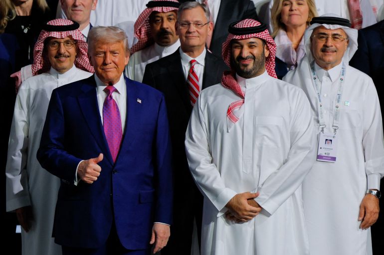 U.S. President Donald Trump and Saudi Crown Prince Mohammed Bin Salman pose for a group photo during the Saudi-U.S. Investment Forum, in Riyadh, Saudi Arabia, May 13, 2025. REUTERS/Brian Snyder