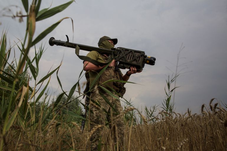 Ukrainian serviceman holds a Stinger anti-aircraft missile at a position in a front line in Mykolaiv region