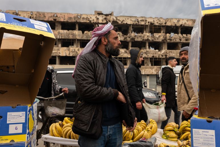 HOMS, SYRIA - JANUARY 22: People visit a market in the city of Homs on January 22, 2025 in Homs, Syria. Homs, the country’s third-largest city, has a mixed population of Sunni and Shia Muslims, Alawites and Christians and was once called the Capital of the Revolution' and was heavily damaged in fighting over the years. Following the overthrow of Syrian leader Bashar al-Assad by opposition groups in a quick offensive on December 8, the country is looking to gain economic momentum after years of global sanctions on the Assad-led government. Arab and Western countries have been reopening diplomatic relations with Syria's new de facto authorities, headed by the Islamist former insurgent group Hayat Tahrir al-Sham, or HTS. Fourteen years of war have left the Syrian economy damaged, with tens of thousands of residents living on or below the poverty line. The World Food Program estimates that 13.1 million Syrians do not have enough to eat. (Photo by Spencer Platt/Getty Images)