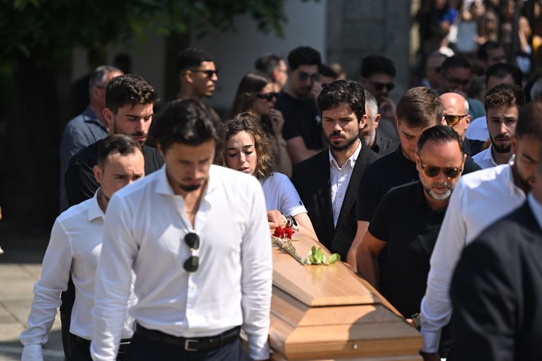 PORTO, PORTUGAL - JULY 05: Families grieve after the funeral ceremony of Liverpool's Portuguese forward Diogo Jota and his brother Andre Silva in Gondomar, on the outskirts of Porto, on July 5, 2025. Liverpool forward Diogo Jota and his brother died in a car crash in Spain on July 3, 2025, sparking widespread grief just after the Portugal star had got married. (Photo by Alex Juarez/Anadolu via Getty Images)