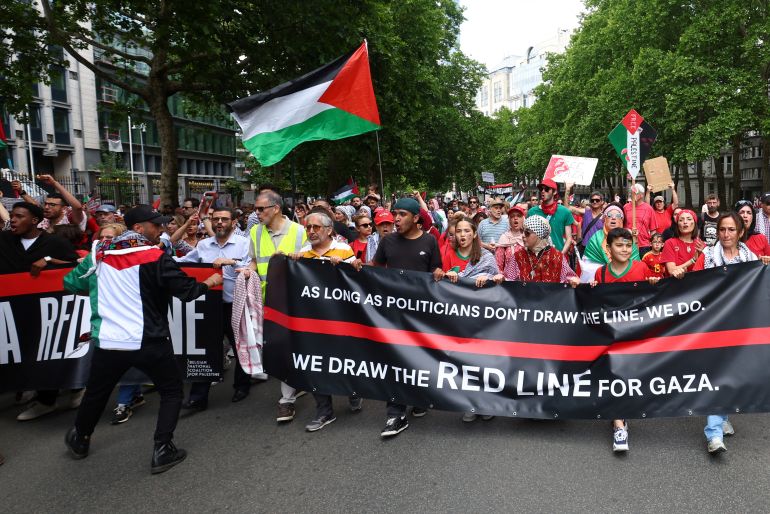 People take part in the Red Line demonstration, protesting against conditions in Gaza and demanding government to impose sanctions against Israel, in Brussels, Belgium, June 15 2025. REUTERS/Yves Herman