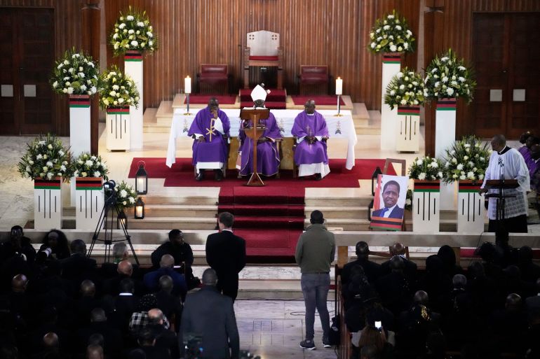 A Mass for former Zambian President Edgar Lungu is celebrated at the Cathedral of Christ the King, in Johannesburg, South Africa, Wednesday, June 25, 2025. (AP Photo/Themba Hadebe)